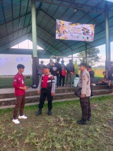 Personil Polsek Petang Jaga Pengamanan Pembukaan Firstsma Futsal Cup III 2023