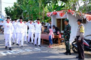 Polsek Kertosono Lakukan Pengamanan Lomba Gerak Jalan Pelajar SMP & SMA